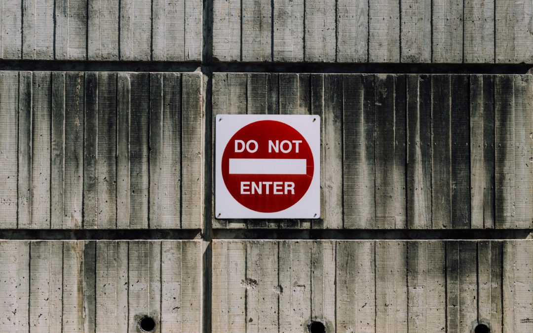 white and red do not enter signage